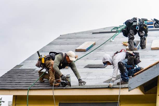 Professional Roofing technician working in Pound Ridge, NY